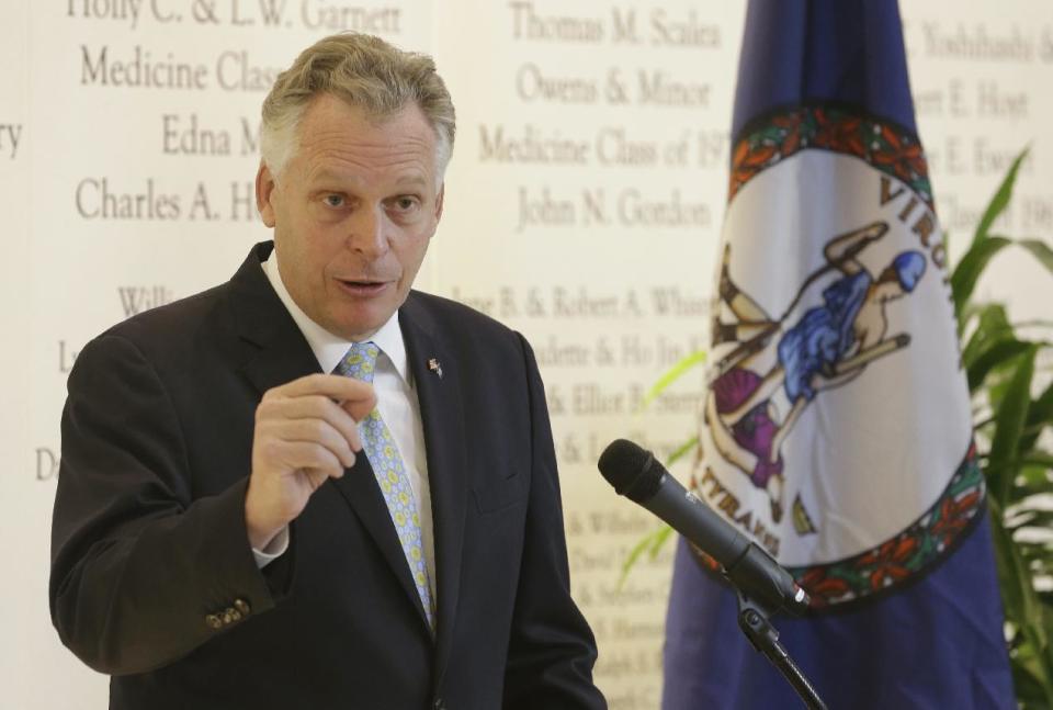 FILE - In this Dec. 18, 2013, file photo, Virginia Gov-elect, Terry McAuliffe, gestures during a news conference in Richmond, Va. McAuliffe’s inauguration as governor of Virginia on Jan. 11,In will highlight a notable Democratic winning streak in one of the nation’s most competitive states, but both Democrats and Republicans say the state remains a tossup going forward. (AP Photo/Steve Helber)