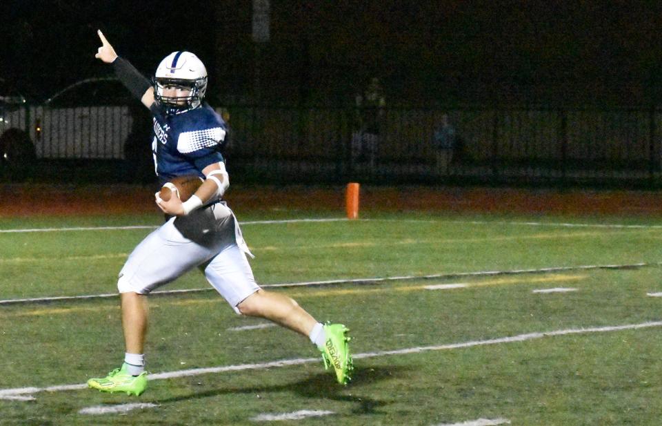Somerset Berkley's Austin DeSouto runs for a touchdown that was called back because of a penalty during Friday's game against Apponequet Oct. 6, 2023.