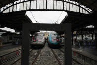 High speed trains stand bye with empty platforms at Gare de L'Est train station in Paris, Saturday, Dec. 7, 2019. French strikes are disrupting weekend travel around the country, as truckers blocked highways and most trains remained at a standstill because of worker anger at President Emmanuel Macron's policies as a mass movement against the government's plan to redesign the national retirement system entered a third day. (AP Photo/Francois Mori)