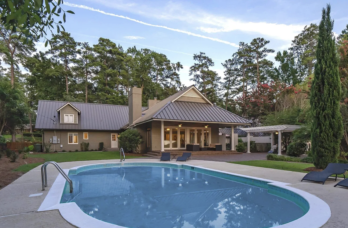 A saltwater pool is located on the property of 5841 Lakeshore Drive in Columbia beside Forest Lake.