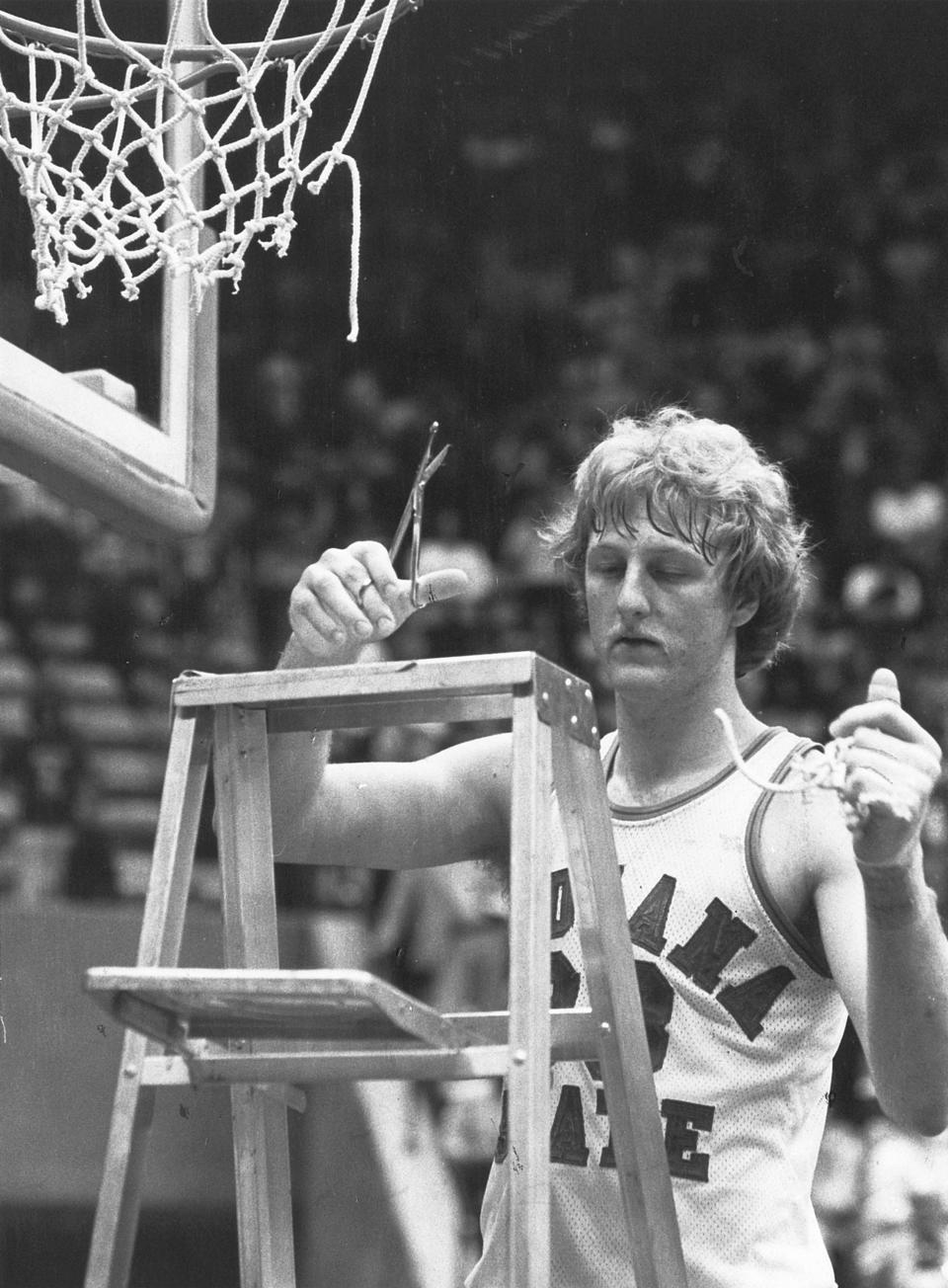 Larry Bird cuts down the net after Indiana State University won the championship game in the Missouri Valley tournament on March 3, 1979. Bird suffered a triple hairline fracture of his left thumb in the game. That year ISU faced Michigan State in the NCAA finals but lost to the Spartans (and Magic Johnson) on March 26,1979,in Salt Lake City.
