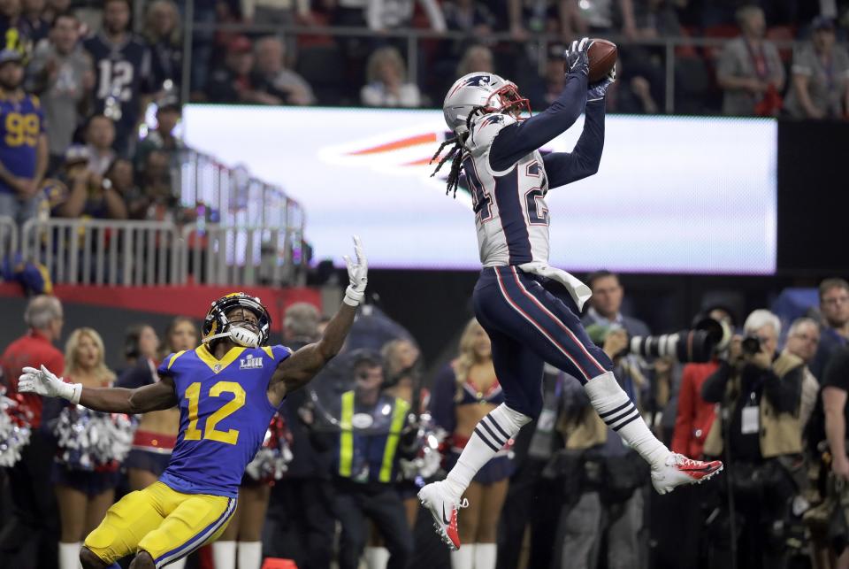 <p>New England Patriots’ Stephon Gilmore, right,<br>intercepts a pass intended for Los Angeles Rams’ Brandin Cooks (12) during the second half of the NFL Super Bowl 53 football game Sunday, Feb. 3, 2019, in Atlanta. (AP Photo/Chuck Burton) </p>