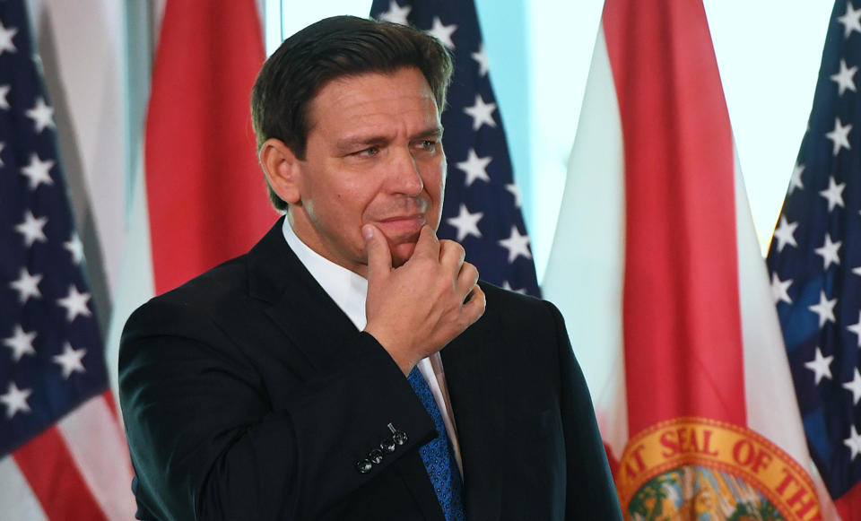 Florida Gov. Ron DeSantis gestures during a press conference to announce the Moving Florida Forward initiative at the SunTrax Test Facility in Auburndale, Florida.  / Credit: Paul Hennessy/SOPA Images/LightRocket via Getty Images