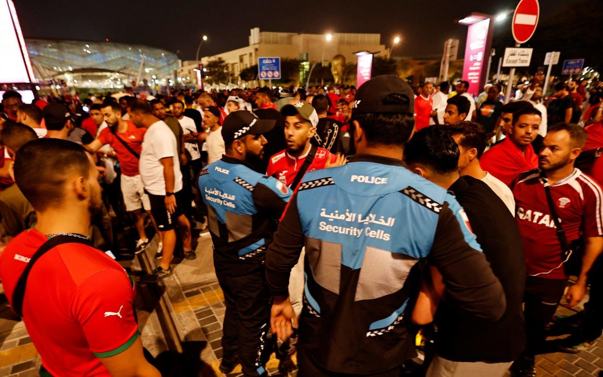 Fans and police outside Education City Stadium - Morocco fans escape ‘crush’ outside stadium ahead of last-16 match with Spain - Hamad I Mohammed/Reuters