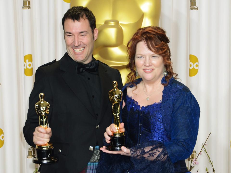 Animators Mark Andrews (left) and Brenda Chapman pose with their Oscars