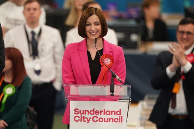 Bridget Phillipson smiles at a lectern after winning the Houghton and Sunderland South constituency at Silkworth Community Pool Tennis & Wellness Centre in Sunderland