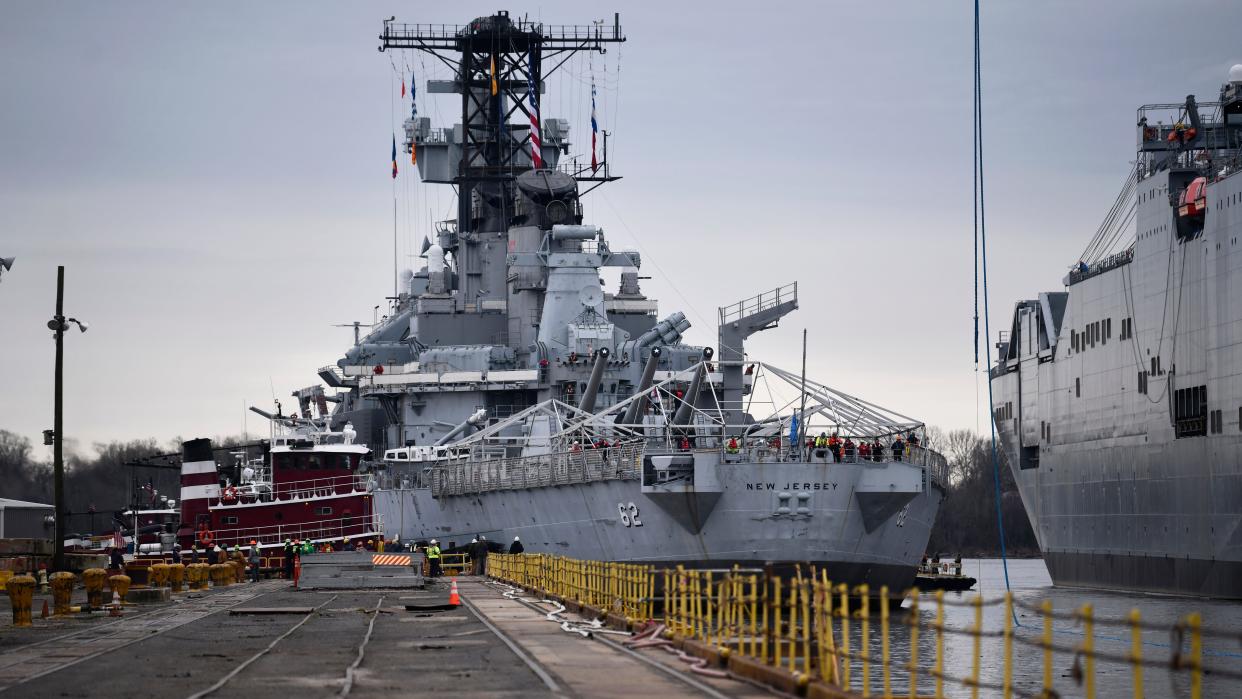 The Battleship New Jersey enters the Philadelphia Naval Shipyard's Dry Dock #3 for a historic dry dock maintenance project on Wednesday, March 27, 2024.