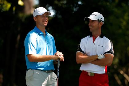 Sammy Schmitz chats with former Masters champ Mike Weir. (Getty Images)