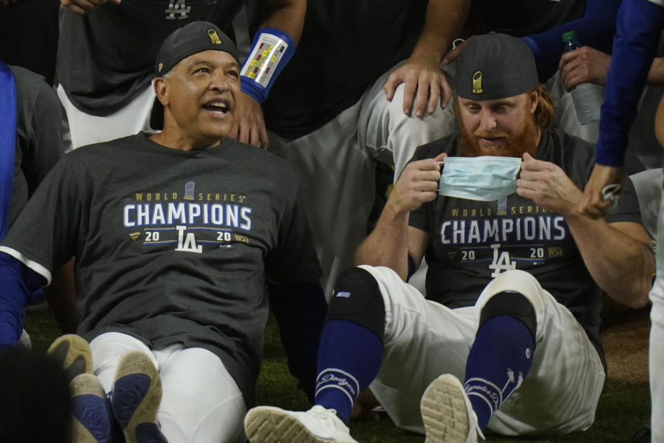 Los Angeles Dodgers celebrate after defeating the Tampa Bay Rays 3-1 to win the baseball World Series in Game 6 Tuesday, Oct. 27, 2020, in Arlington, Texas. (AP Photo/Eric Gay)