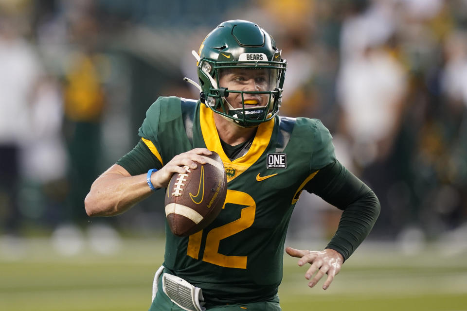 Baylor quarterback Blake Shapen looks to pass as he runs to score a touchdown against Albany during the first half of an NCAA college football game in Waco, Texas, Saturday, Sept. 3, 2022. (AP Photo/LM Otero)