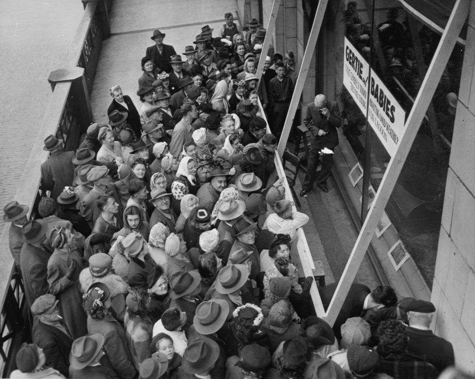 Scores of people crowd around the display window at Gimbels to get a closer look at Gertie the duck and her five surviving ducklings on June 1, 1945. Gertie and her brood had been sitting atop pilings in the Milwaukee River, but they were brought into Gimbels when harsh weather put them at risk.