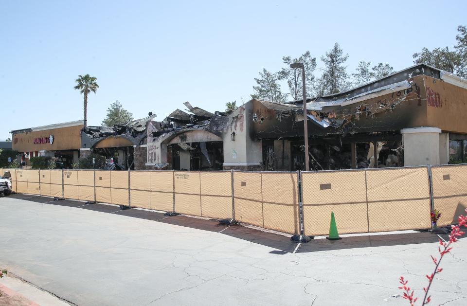 A building in the Plaza De Monterey Shoping Center that contained Papa Dan's, D'Coffee Bouteaque, Miracle Ear and Reverse Mortgage Works was destroyed by fire in the early morning of April 15, 2024 in Palm Desert, Calif..