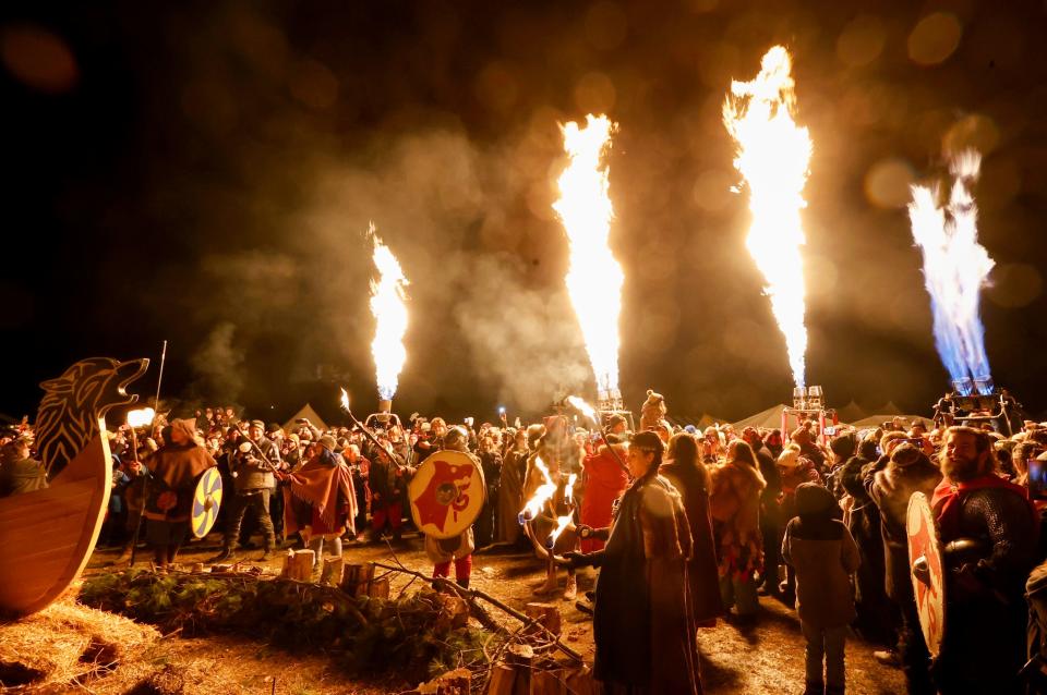 Fire and celebration during the opening ceremonies at Michigan Nordic Fire Festival at the Eaton County Fairgrounds in Charlotte on Friday, Feb. 24, 2023.The burning of the Viking ship has been tradition to open the festival for the past six years.