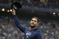 Tampa Bay Rays' Kevin Kiermaier gestures to fans after a video tribute to him was played during the second inning of the team's baseball game against the Toronto Blue Jays on Saturday, Sept. 24, 2022, in St. Petersburg, Fla. Kiermaier is out for the season. (AP Photo/Scott Audette)