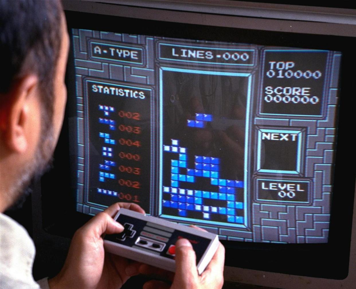 Tetris has hooked people for decades. <a href="https://newsroom.ap.org/detail/MusicofGaming/8f0f44af03b145208aa578e21b453275/photo?Query=tetris&mediaType=photo&sortBy=&dateRange=Anytime&totalCount=284&digitizationType=Digitized&currentItemNo=1&vs=true&vs=true" rel="nofollow noopener" target="_blank" data-ylk="slk:AP Photo/Richard Drew;elm:context_link;itc:0;sec:content-canvas" class="link ">AP Photo/Richard Drew</a>