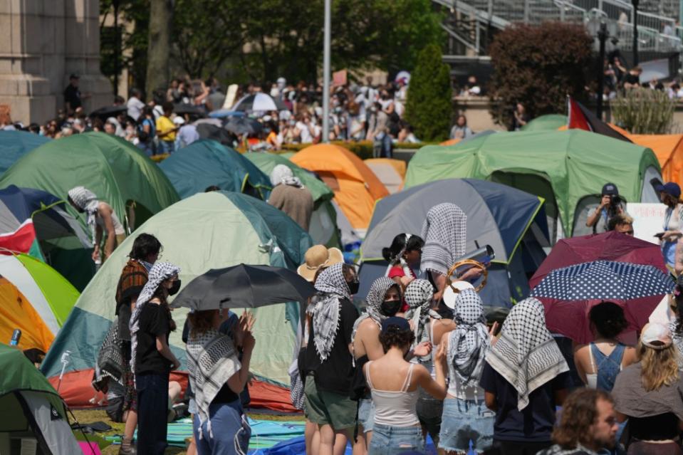 Anti-Israel protesters gathered at an encampment on the lawn of Columbia University, surrounded by tents, after a deadline to vacate was issued. James Keivom