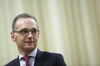 German Foreign Minister Heiko Maas meets Chinese Vice President Wang Qishan at the Great Hall of the People in Beijing Tuesday, Nov. 13, 2018. (Thomas Peter/Pool Photo via AP)