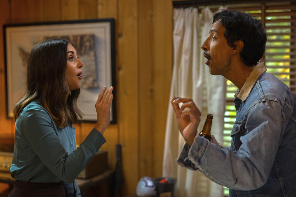 This image released by Amazon Prime Video shows Alison Brie, left, and Danny Pudi in a scene from "Somebody I Used to Know." (Scott Patrick Green/Amazon Prime Video via AP)