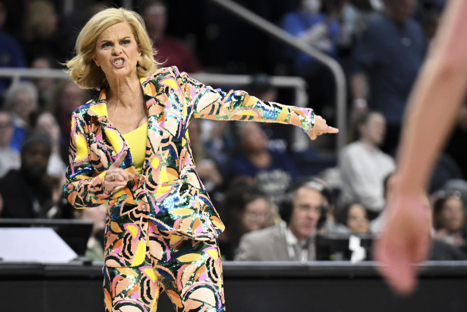 LSU head coach Kim Mulkey reacts during the second quarter of a Sweet Sixteen round college basketball game against the UCLA during the NCAA Tournament, Saturday, March 30, 2024, in Albany, N.Y. (AP Photo/Hans Pennink)
