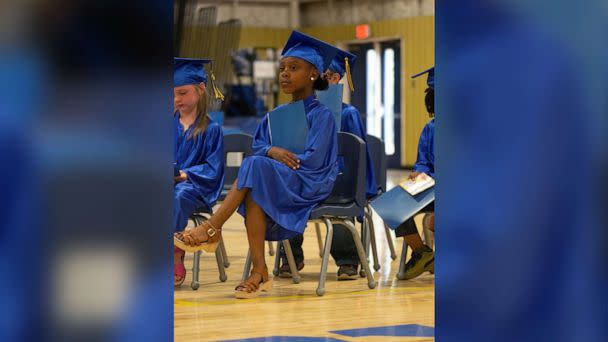 PHOTO: A photo of DeLexus Sims' daughter Taylor, looking confident and poised at her kindergarten graduation, has gone viral. (Courtesy of Demarcus Green)