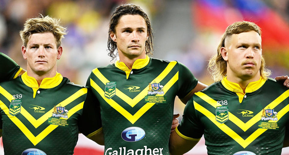 Nicho Hynes is pictured in the middle before the Kangaroos' Test against Samoa.