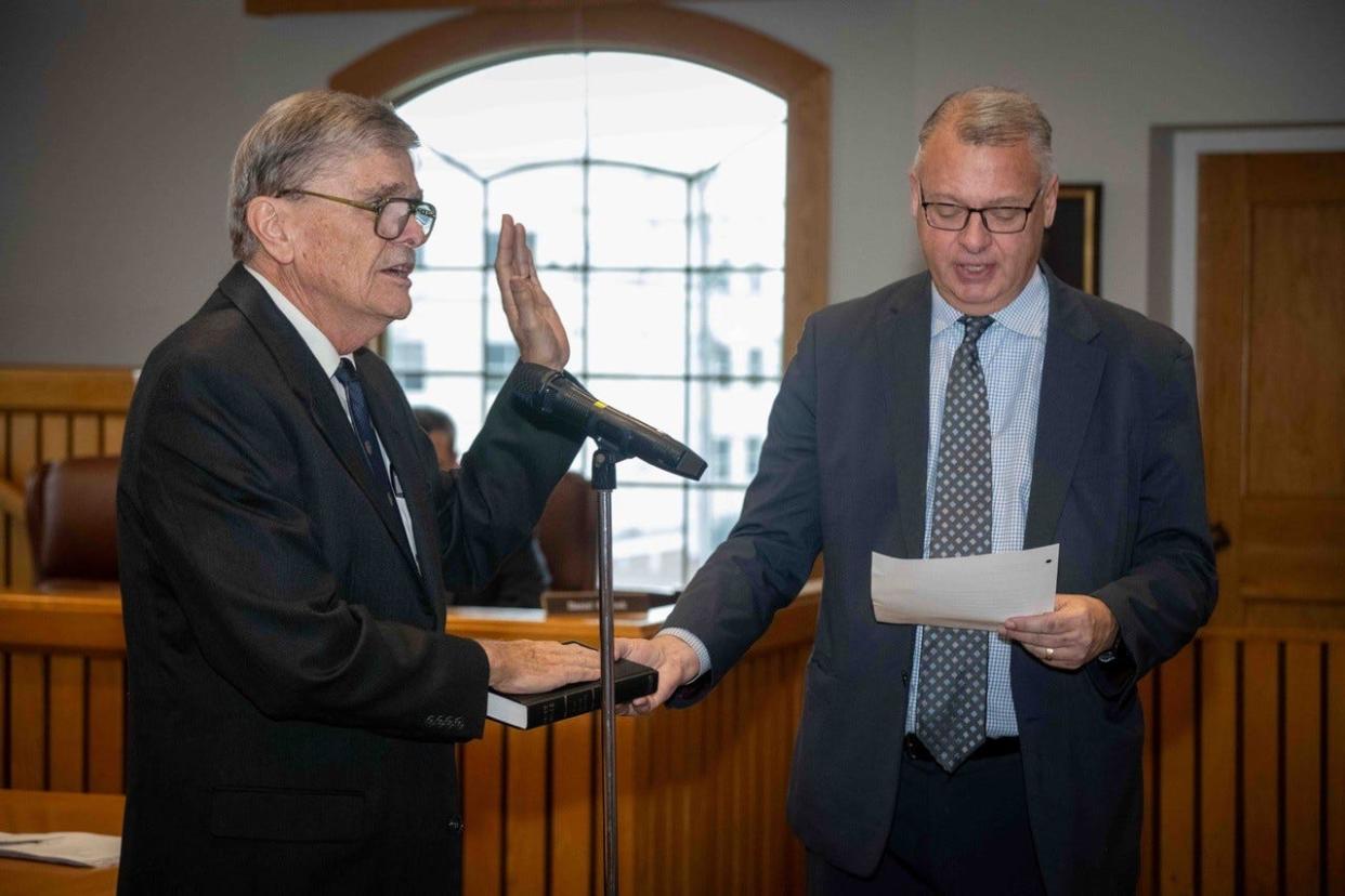 Craig Coleman takes the oath of office for a Toms River Township Council seat from lawyer James Braaten on Jan. 1, 2024.