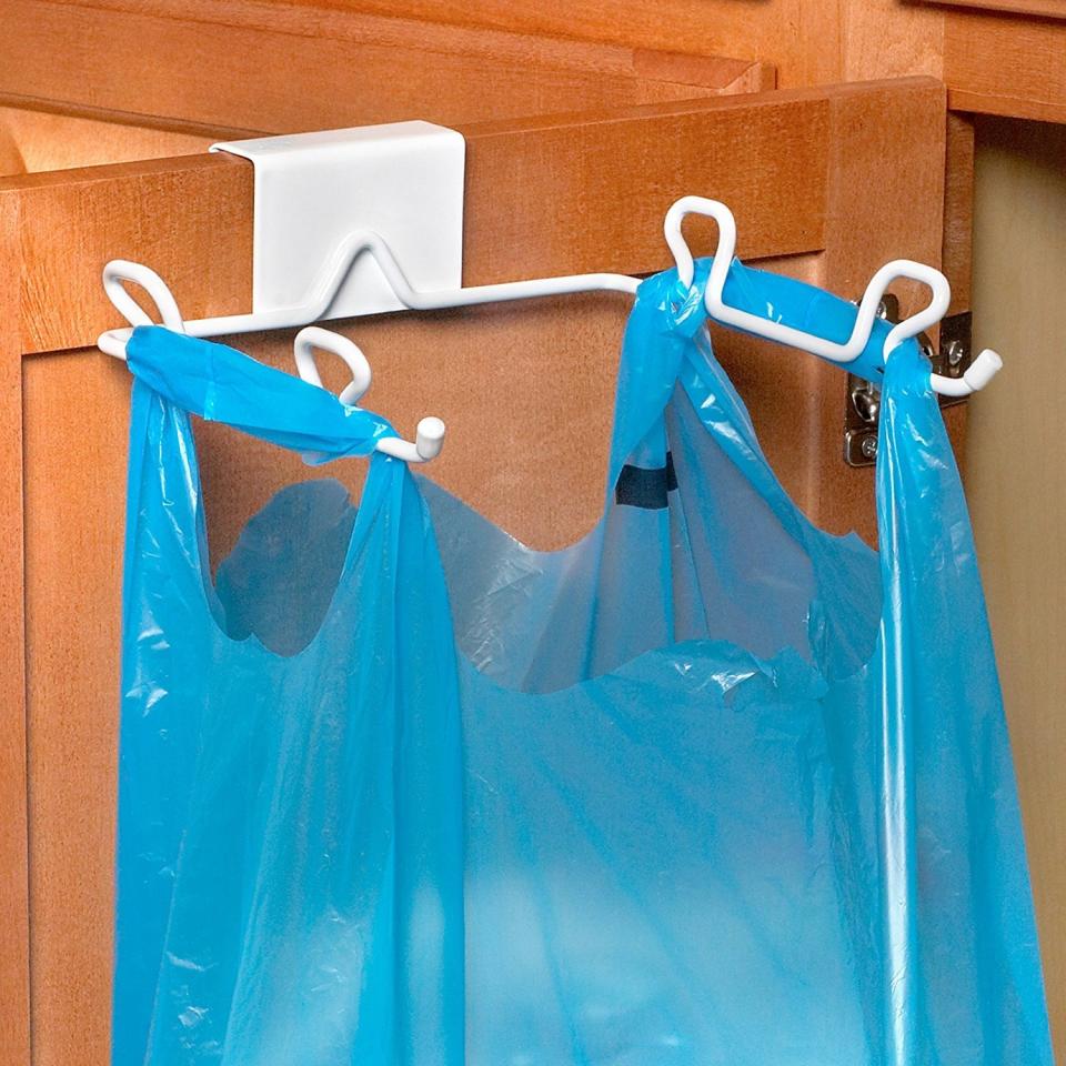 If you don't have space for a recycling bin, this is a a smart way to make space where it didn't exist before. You can even use it in a small bathroom as a&nbsp;clever&nbsp;trash can. Get it <a href="https://www.amazon.com/Spectrum-Diversified-Over-Cabinet-Holder/dp/B002YLA86E/" target="_blank">here</a>.&nbsp;