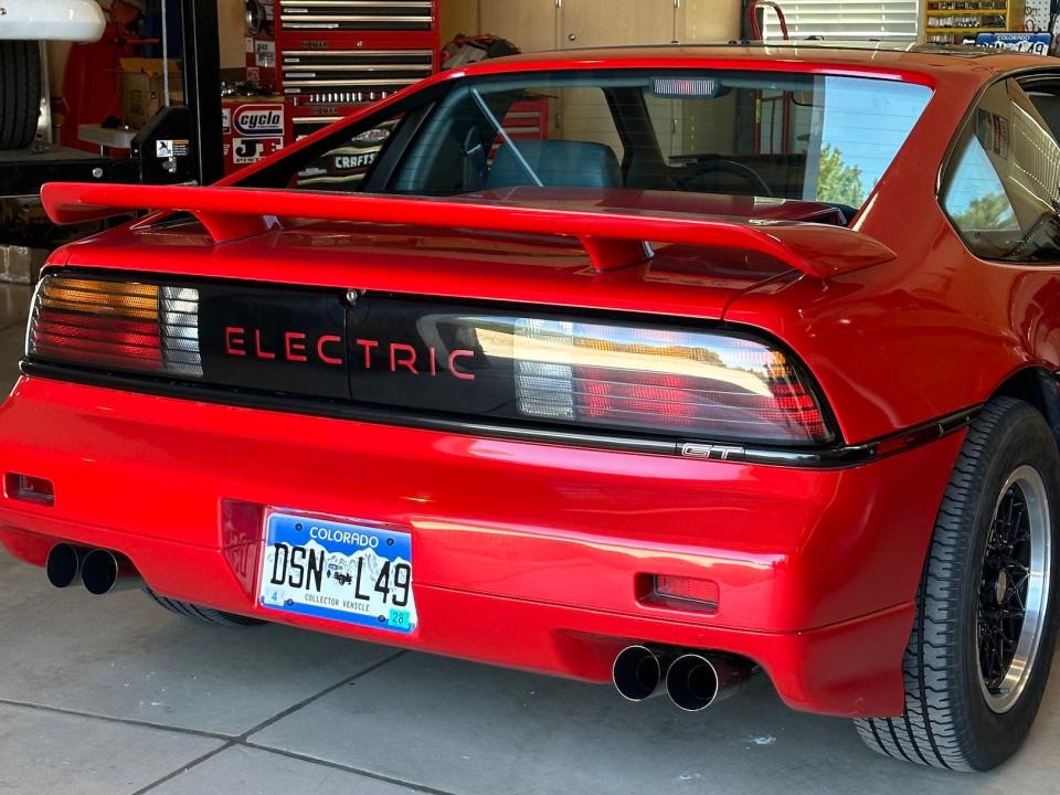 1988 Pontiac Fiero GT EV by Classic EV Conversions. The rear panel says "electric" instead of Pontiac.