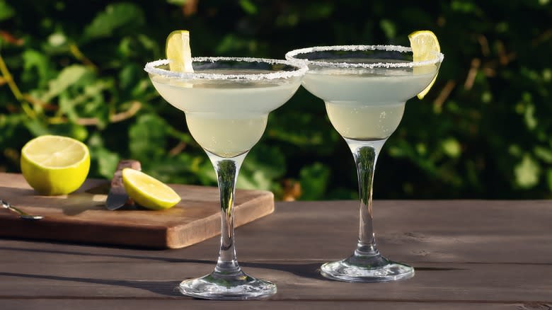 Two margaritas on a table