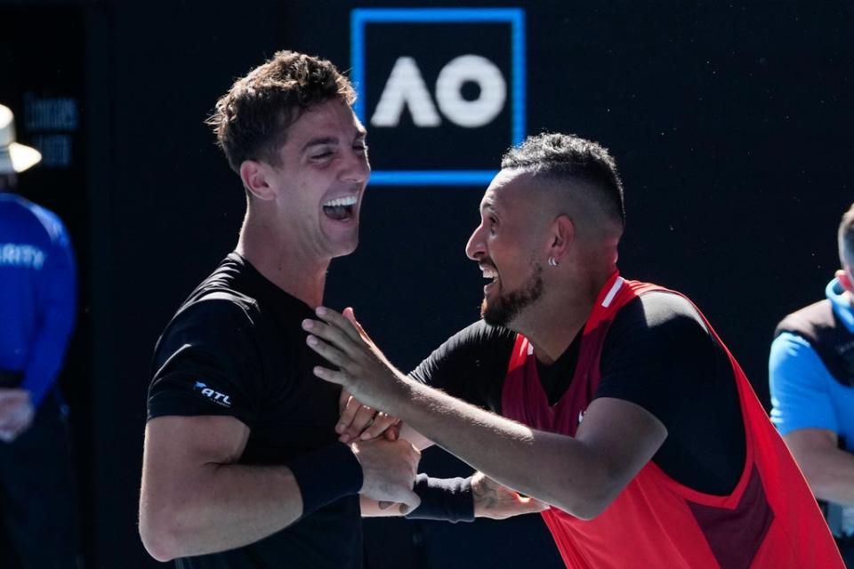 Nick Kyrgios, right, and Thanasi Kokkinakis celebrate their semi-final victory (Simon Baker/AP) (AP)