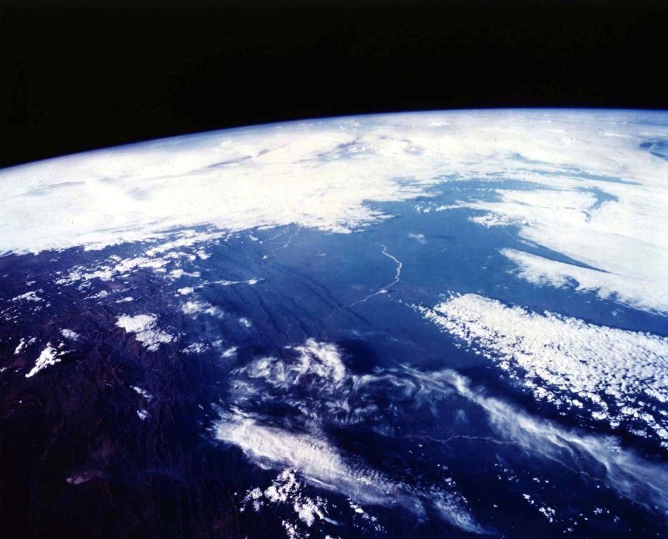 The planet is thought to be able to support water and an atmosphere, like our Earth (pictured) (Image: Rex)