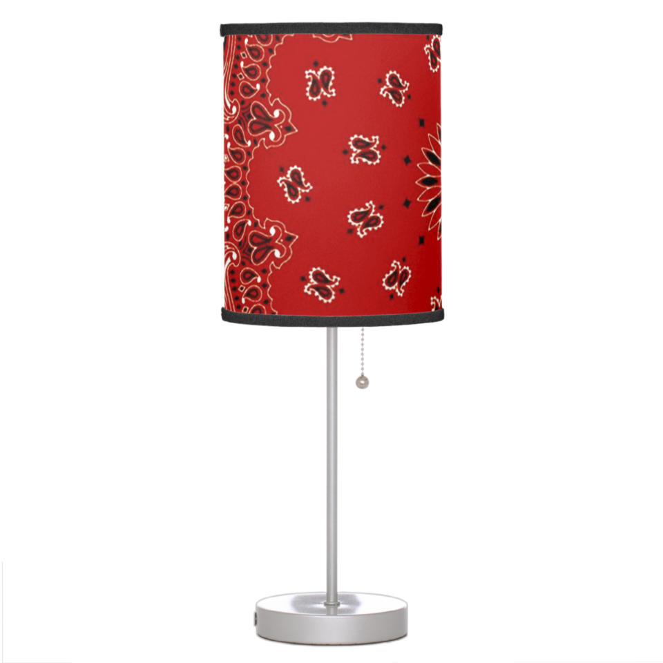This image released by Zazzle shows a lamp with a shade that features a bandana paisley motif. The lamp also comes in blue, purple, turquoise, green or gold. (Zazzle via AP)