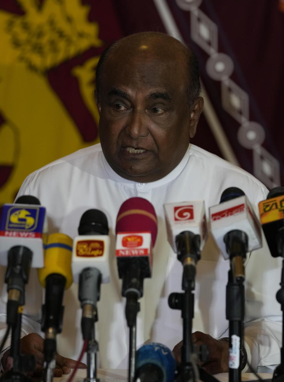 Sri Lanka's Parliament Speaker Mahinda Yapa Abeywardana speaks during a press conference in Colombo, Sri Lanka, Friday, July 15, 2022. Abeywardana says President Gotabaya Rajapaksa has resigned and Parliament will convene to choose a new leader after massive protests took over government buildings to force him out of office. (AP Photo/Rafiq Maqbool)