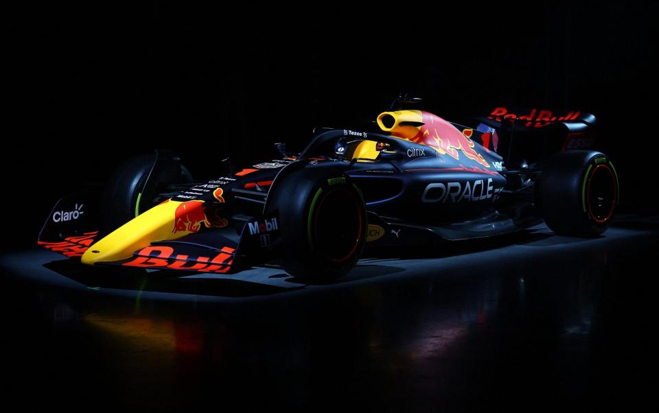 A handout photograph taken on January 26, 2022 and released on February 9, 2022 by Red Bull shows the new Red Bull Racing RB18 car during its launching presentation at Red Bull Racing Factory, in Milton Keynes, England