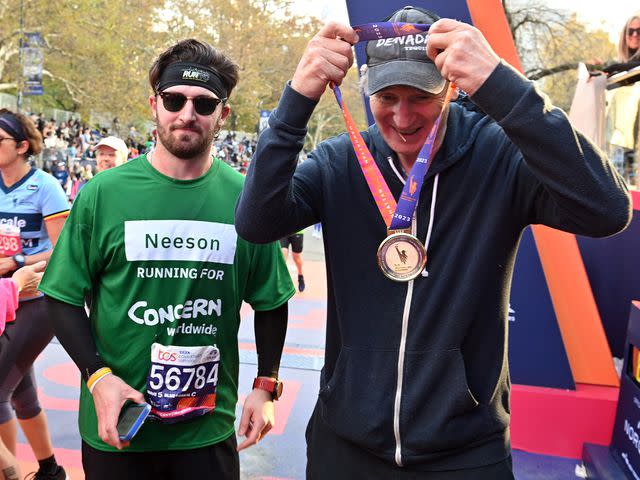 <p>Bryan Bedder/Getty</p> Liam Neeson and his son Daniel Neeson participate in the 2023 TCS New York City Marathon on November 5, 2023 in New York City.