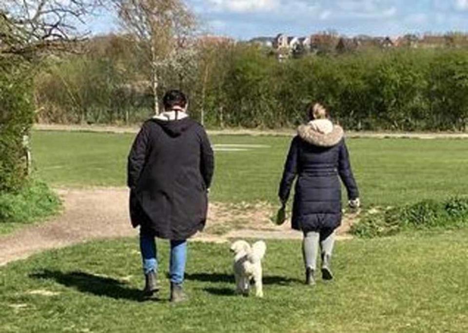 Sarah with her husband and Lenny on a walk (PA Real Life)