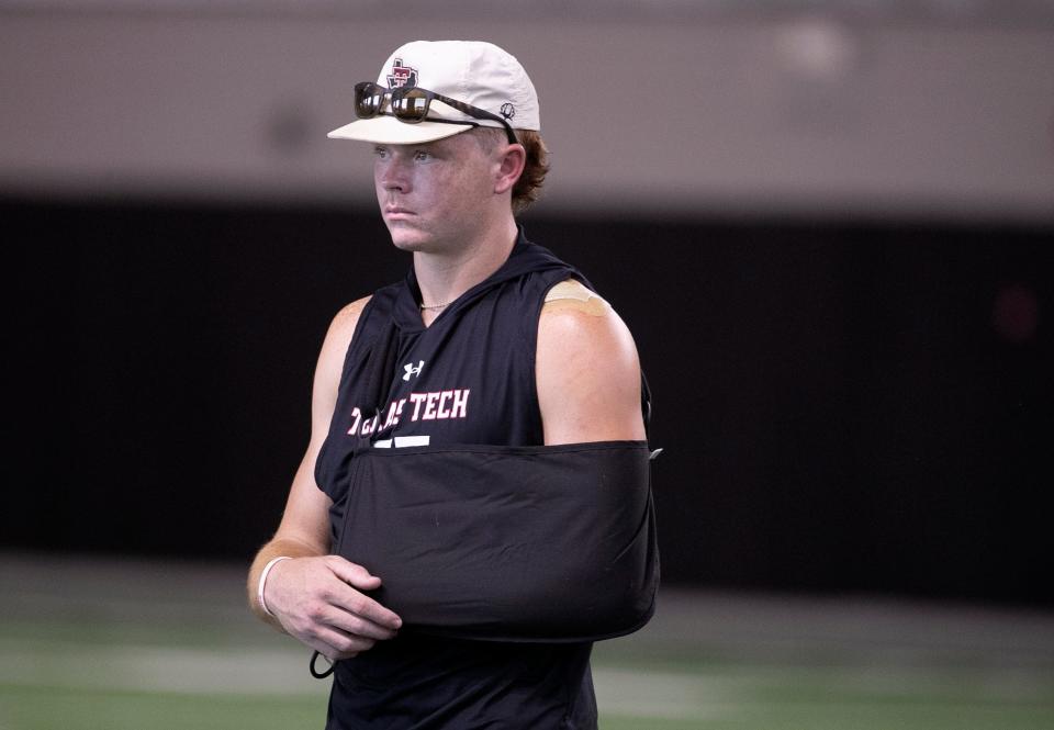 Texas Tech’s Coy Eakin wears a sling during football practice, Wednesday, Aug. 9, 2023, at the Sports Performance Center. 