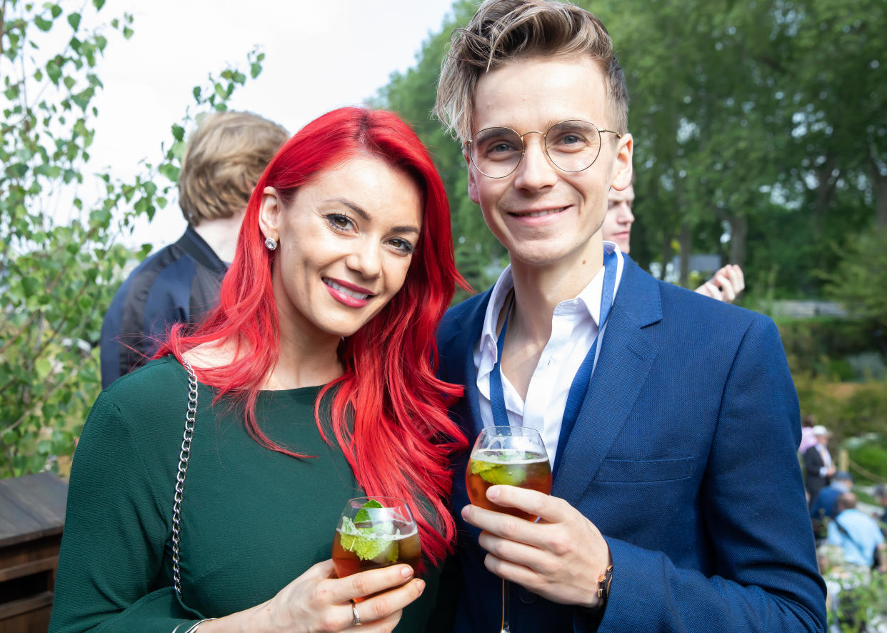 London, UK. 20th May, 2019. Dianne Buswell and Joe Sugg from Strictly Come Dancing attend RHS Chelsea Flower Show Press Day which takes place before it officially opens tomorrow until Saturday 25th May. The world renowned flower show is a glamourous, fun and an educational day out which is attended by many celebrities. There are many gardens, floral displays, Marquees all set in the glorious grounds of The Royal Hospital Chelsea. Credit: Keith Larby/Alamy Live News