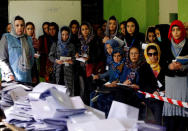 Election observers watch the counting of ballots during parliamentary elections at a polling station in Kabul, Afghanistan October 21, 2018.REUTERS/Mohammad Ismail