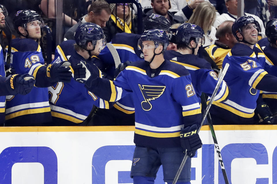 St. Louis Blues center Tyler Bozak (21) is congratulated after scoring a goal against the Nashville Predators in the second period of an NHL hockey game Sunday, Feb. 16, 2020, in Nashville, Tenn. (AP Photo/Mark Humphrey)