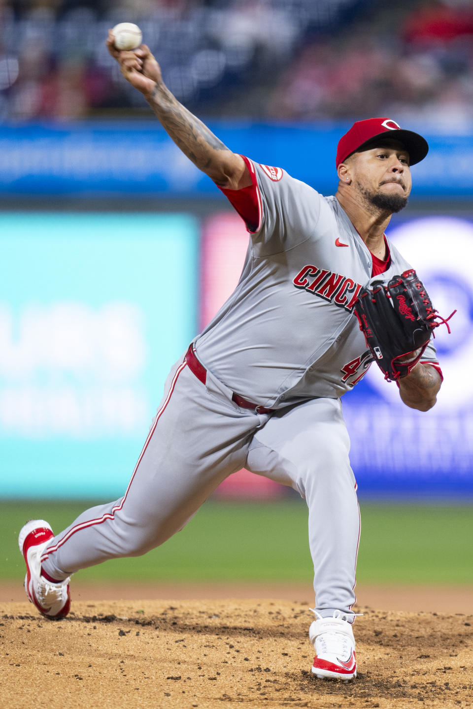 Cincinnati Reds starting pitcher Frankie Montas delivers during the first inning of the team's baseball game against the Philadelphia Phillies, Wednesday, April 3, 2024, in Philadelphia. (AP Photo/Chris Szagola)