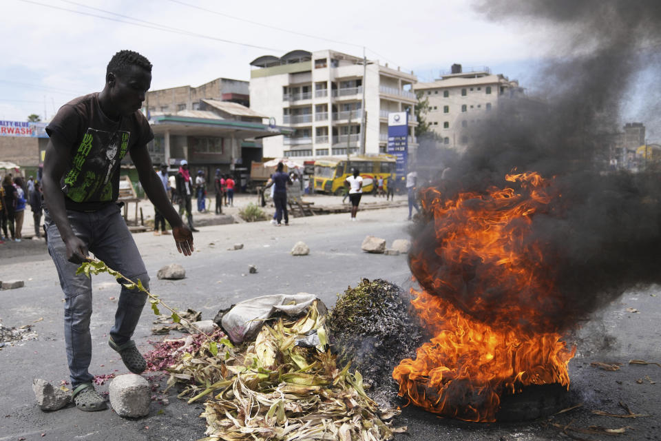 Protesters block Nairobi- Mombasa highway in the Mlolongo area, Nairobi, Kenya Tuesday, July 2, 2024. Protests have continued to rock several towns in Kenya including the capital Nairobi, despite the president saying he will not sign a controversial finance bill that sparked deadly protests last week. (AP Photo/Brian Inganga)