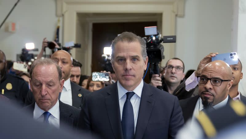 Hunter Biden, President Joe Biden’s son, accompanied by his attorney Abbe Lowell, right, leaves a House Oversight Committee hearing as Republicans are taking the first step toward holding him in contempt of Congress on Wednesday, Jan. 10, 2024, on Capitol Hill in Washington.