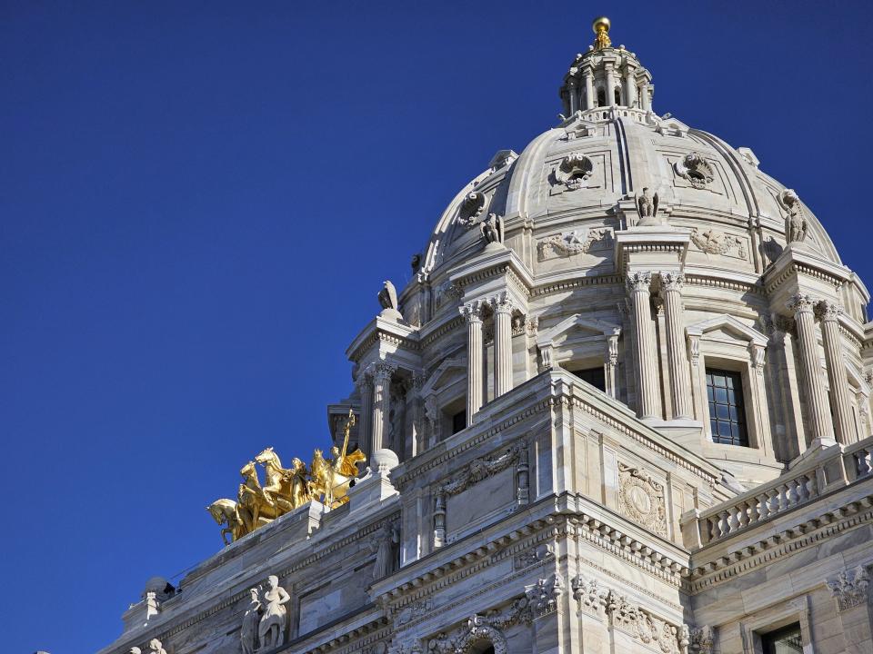 The dome of the Minnesota State Capitol in St. Paul is shown on Wednesday, April 24, 2024, ahead of a vote on a Republican attempt to expedite an ethics investigation of Democratic Sen. Nicole Mitchell, who's facing a felony burglary charge. (AP Photo/Steve Karnowski)