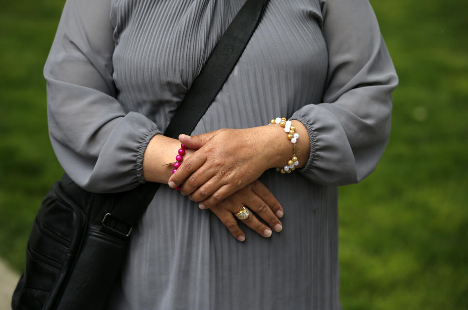 Pregnant Ashurma Arab, one of the Afghan asylum-seekers who was deported to Serbia in the middle of the night, stands in a center for asylum-seekers in the northern Serbian city of Subotica, Wednesday, May 8, 2019. Hungary, which greatly tightened asylum procedures last year, rejected the families' asylum requests and gave them the choice of being expelled to Serbia or being flown back to Afghanistan. (AP Photo/Darko Vojinovic)