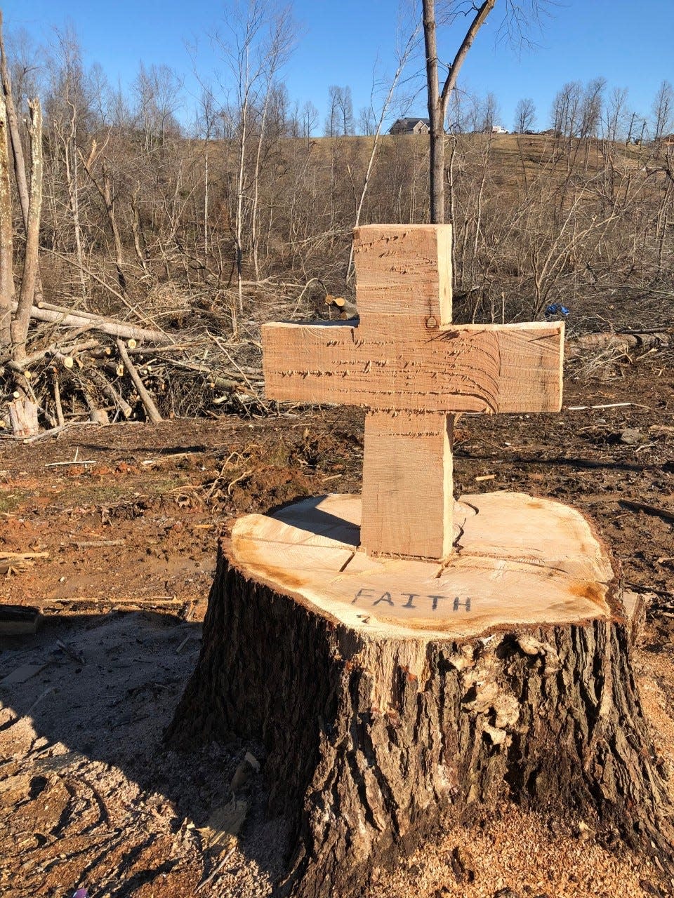 The Northeast Georgia volunteers came upon this cross carved into a stump with a chainsaw and later learned it was done by a man from Bowman, Ga.