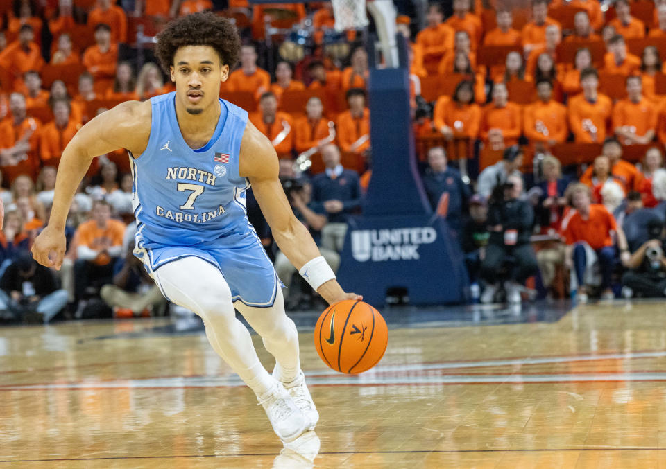 North Carolina Tar Heels guard Seth Trimble (7) dribbles against the Virginia Cavaliers at John Paul Jones Arena.