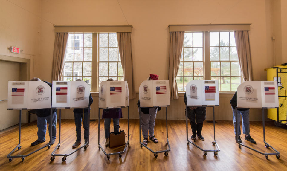 Voters fill out their ballots at the Old Stone School polling location in Hillsboro, Virginia, on Nov. 6. (Photo: Bill Clark via Getty Images)