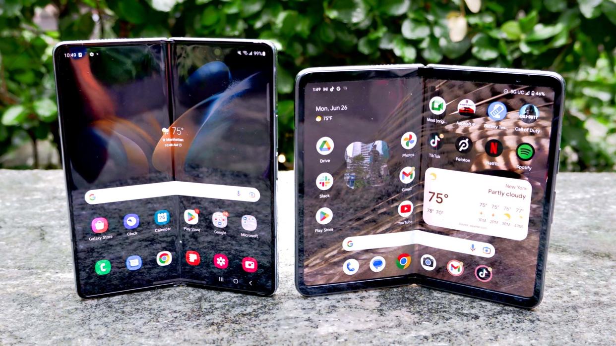  Samsung Galaxy Z Fold 4 and Google Pixel Fold thickness laying flat on a tablet 