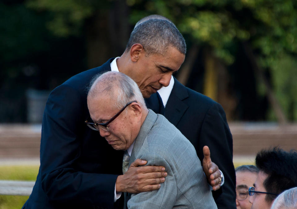 <p>President Barack Obama hugs Shigeaki Mori (front), a survivor of the 1945 atomic bombing of Hiroshima, during a visit to the Hiroshima Peace Memorial Park on May 27, 2016. Obama on May 27 paid moving tribute to victims of the world’s first nuclear attack. (Jim Watson/AFP/Getty Images) </p>